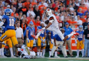 Oregon State's Seth Collins gets airborn during a run in the first half of an NCAA college football game against San Jose State in Corvallis, Ore., Saturday, Sept. 19, 2015. (AP Photo/ Timothy J. Gonzalez)